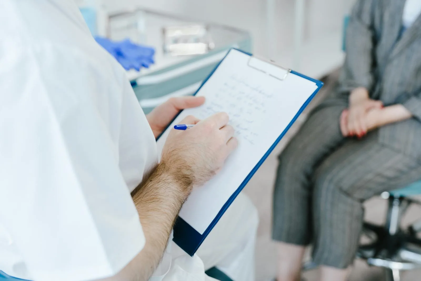 A clinician reviewing a patient's treatment-response data on a tablet between visits.