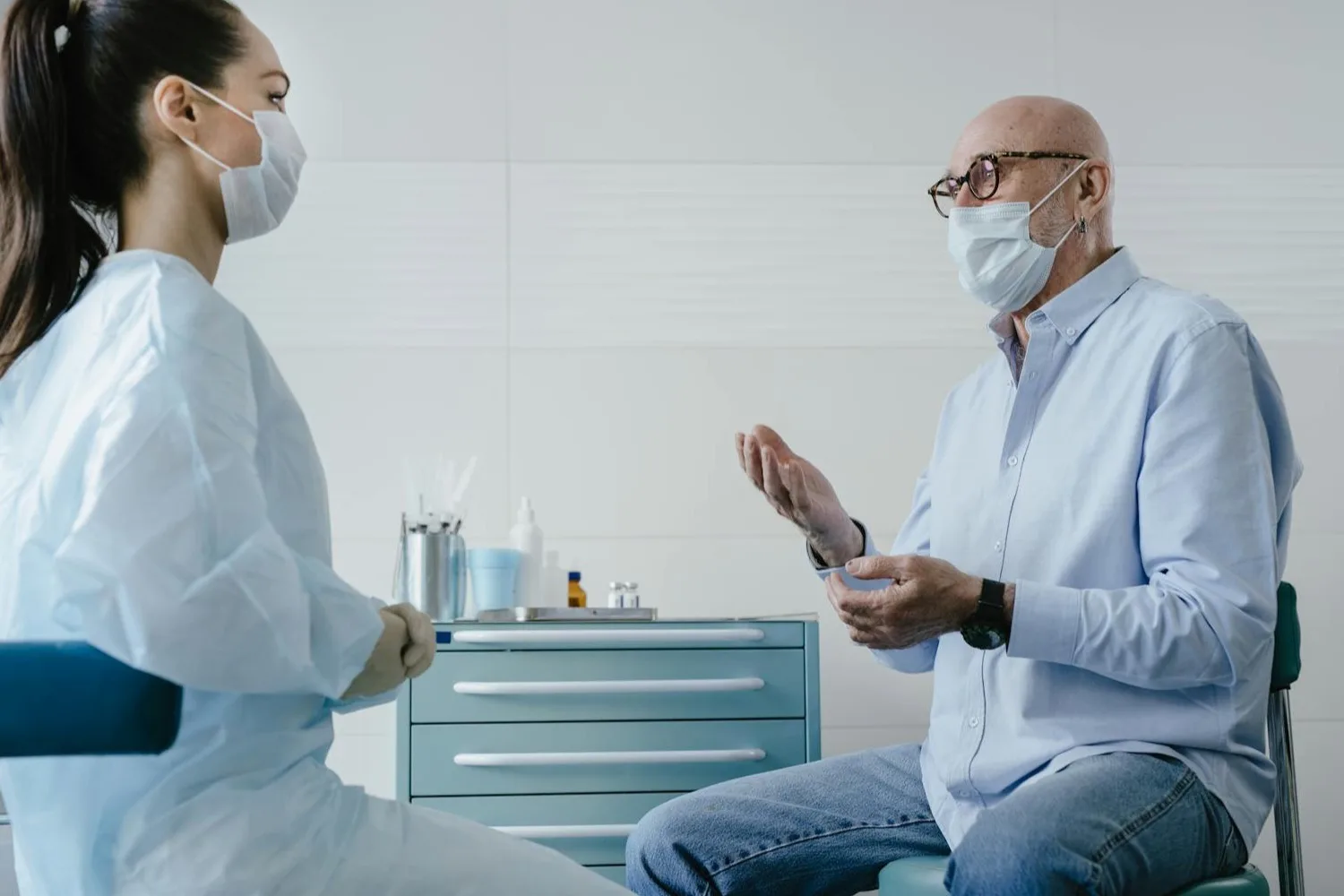 A veteran in a clinical care setting, in conversation with a clinician.